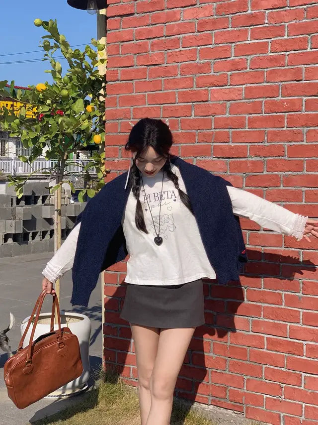 甜美蕾絲拼布長袖T卹 X3198