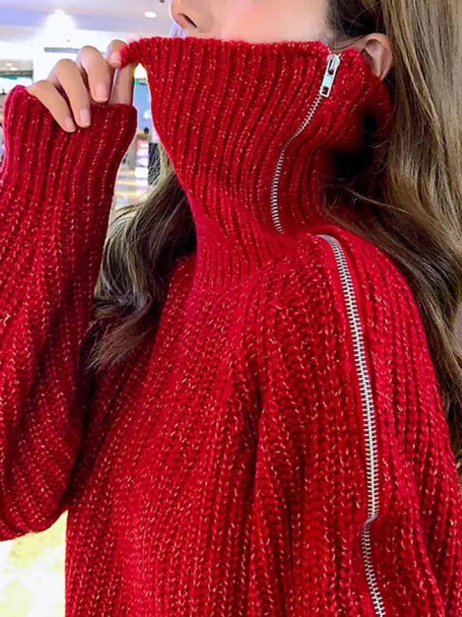 Sweater with zipper outlet on shoulder